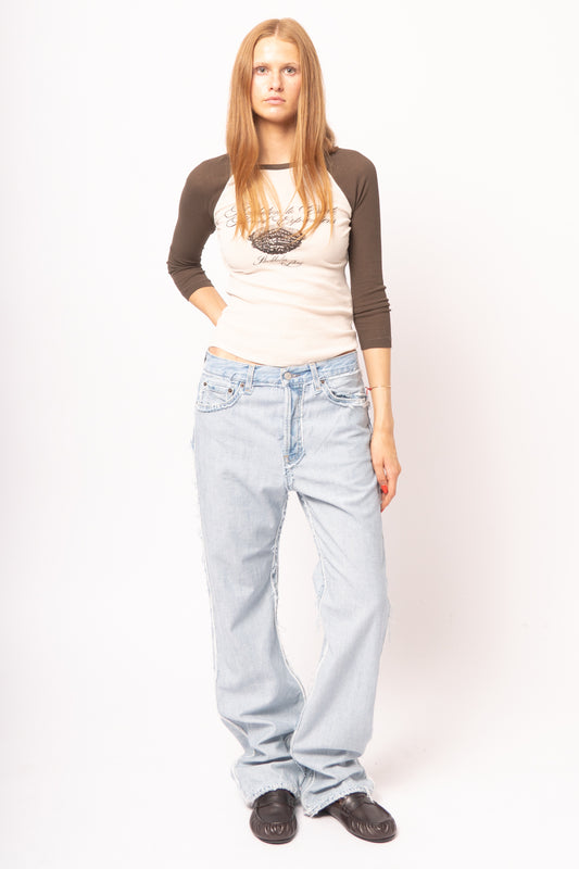 Frayed Light Blue Denim Jeans