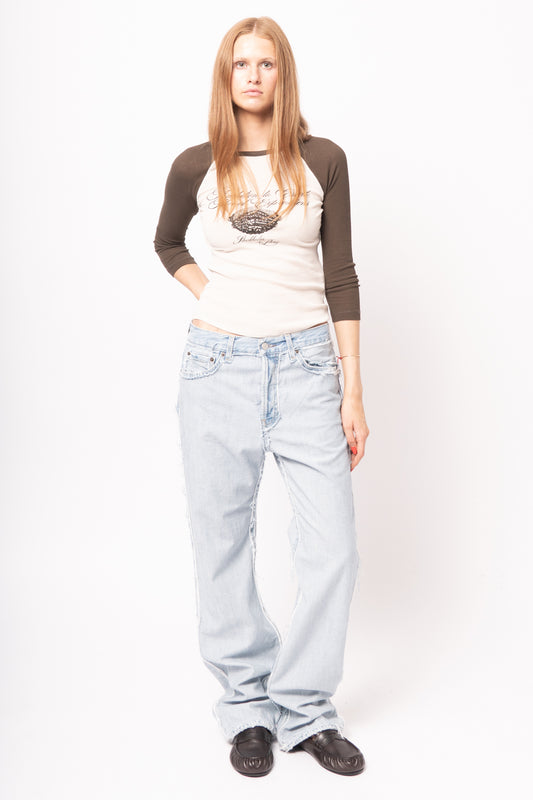 Frayed Light Blue Denim Jeans