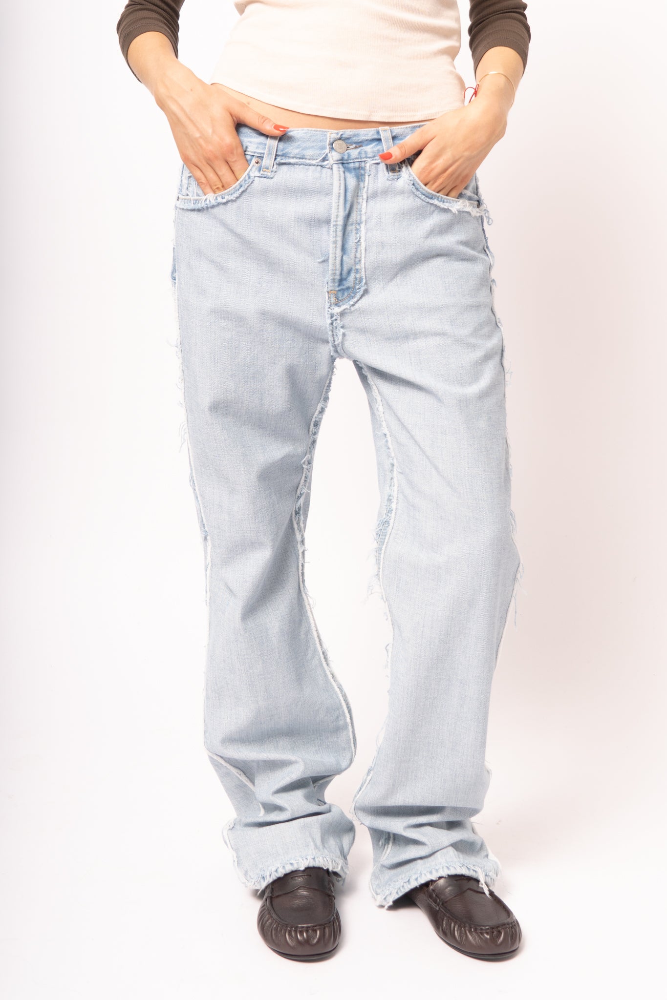 Frayed Light Blue Denim Jeans