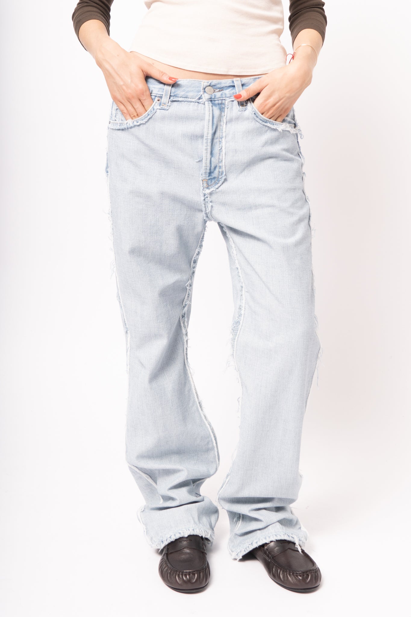 Frayed Light Blue Denim Jeans