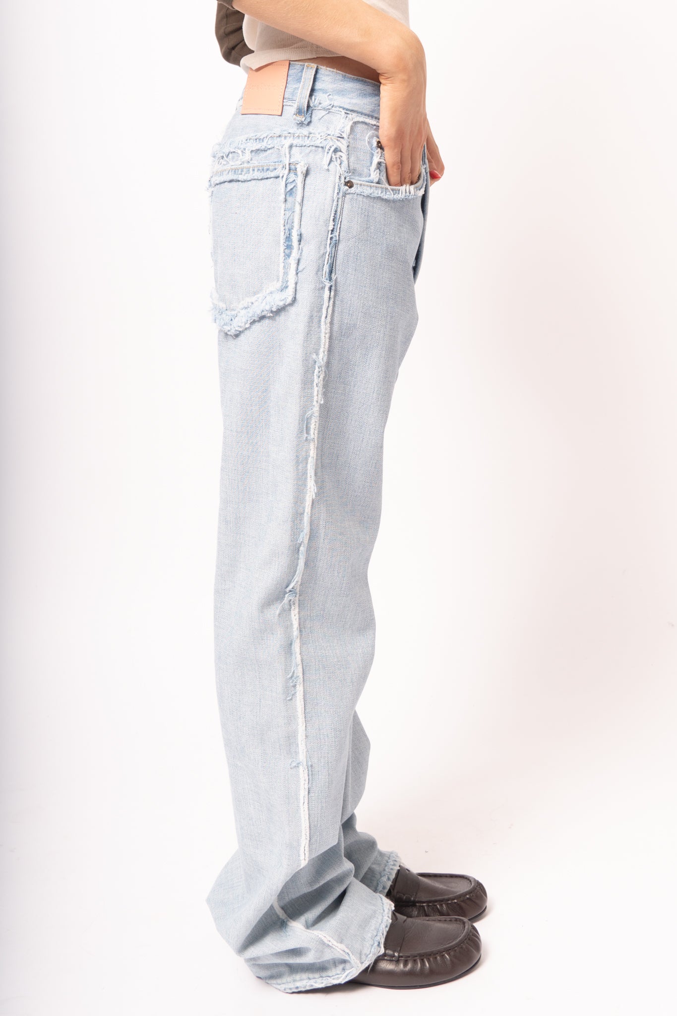 Frayed Light Blue Denim Jeans